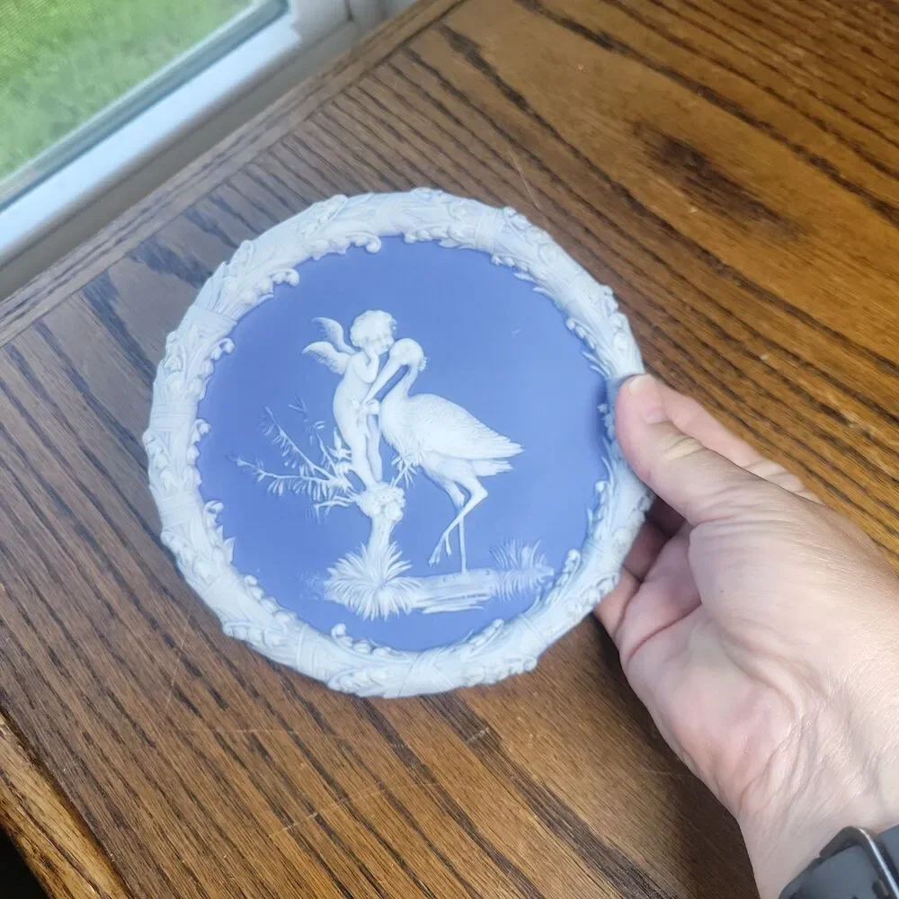 Schafer & Vater Blue & White Jasperware Plaque Featuring a Cherub & Stork Lily
